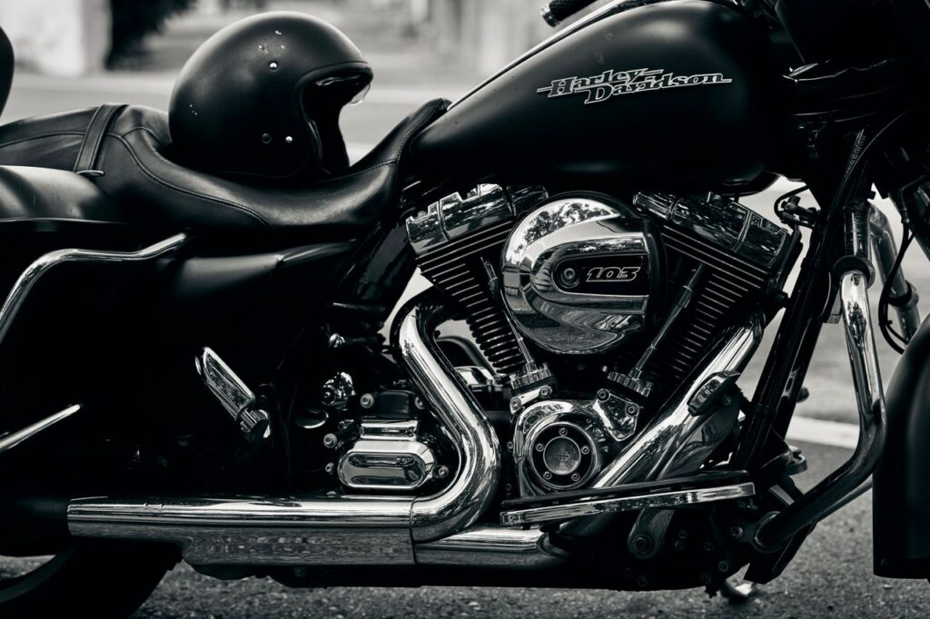 Detailed view of a Harley Davidson motorcycle showing its engine and chrome details.